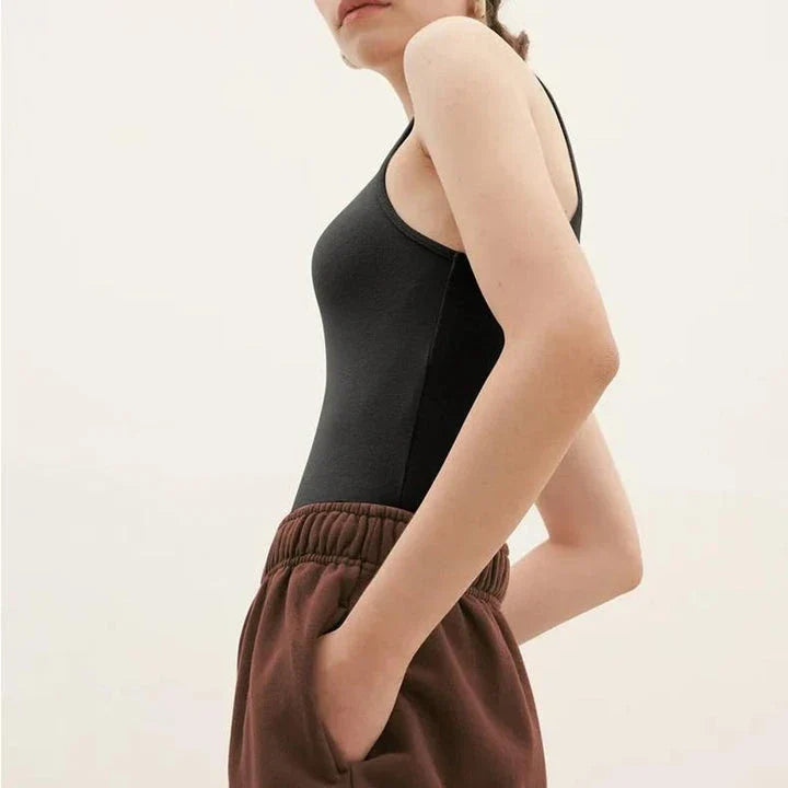 Stylish summer bodycon tank top for Kiwi women, featuring a comfortable and flattering design in a classic beige color.