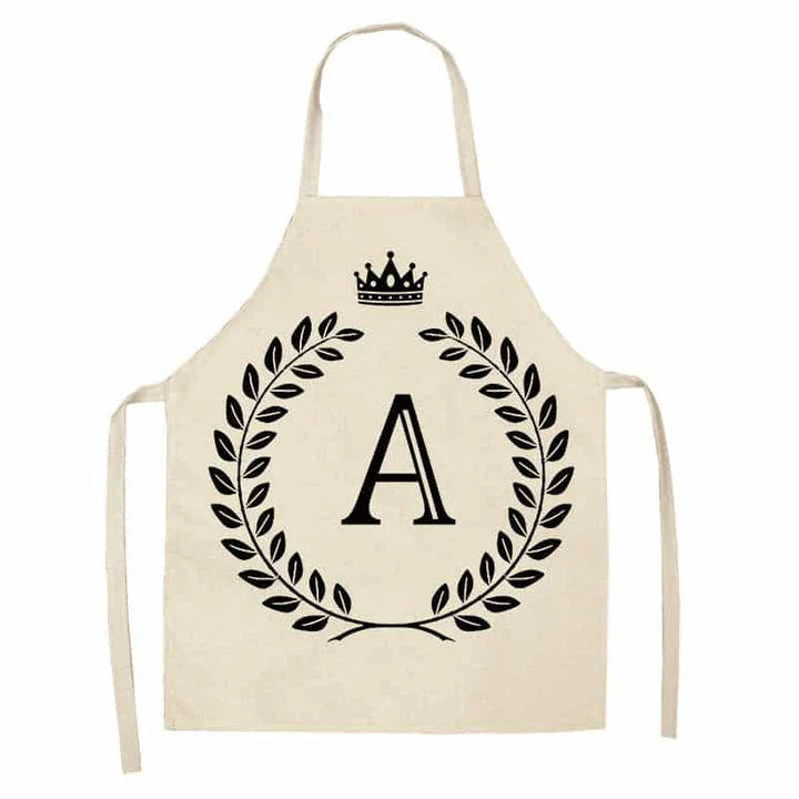 A crown and letter printed kitchen apron made of high-quality cotton and linen, suitable for both men and women in New Zealand kitchens.