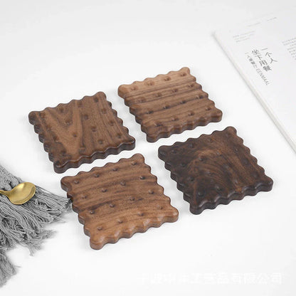 Natural wooden cookie-shaped coasters in beige and brown, handcrafted in New Zealand from premium solid wood