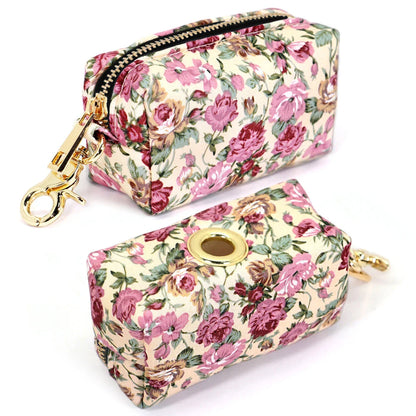 Durable nylon dog bag with floral print design, featuring multiple compartments for treats, waste bags, and other essentials.