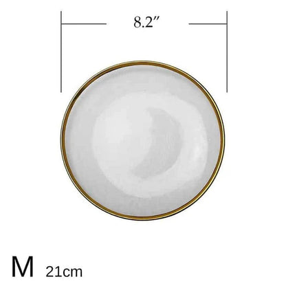 Elegant glass plates with a shimmering gold rim, perfect for formal dinners or casual meals.