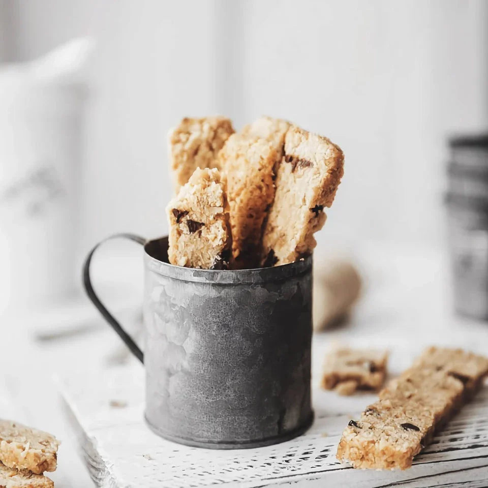 Vintage-inspired metal beverage cup with a charming wrought iron handle, perfect for serving desserts, fruits, and snacks