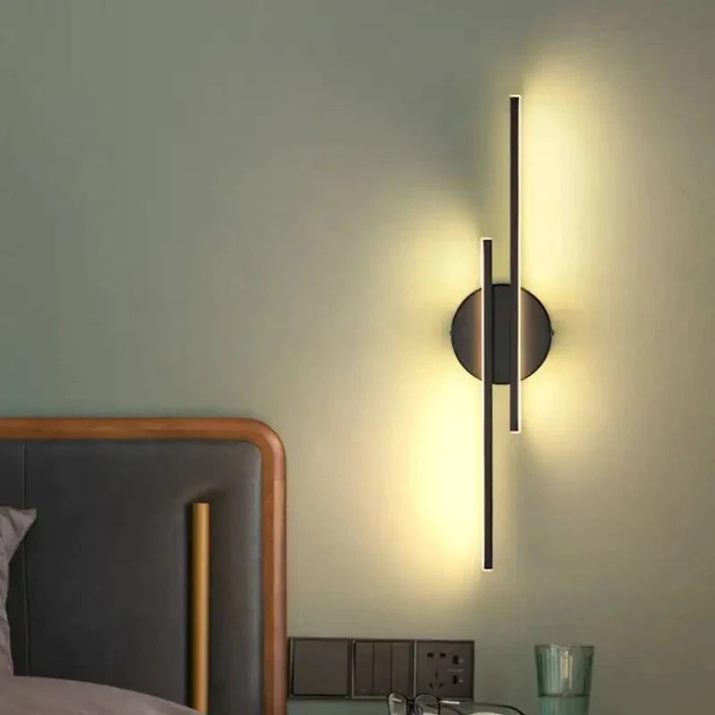 Stylish double linear LED wall light in black, creating warm and cosy ambience in a modern Kiwi home