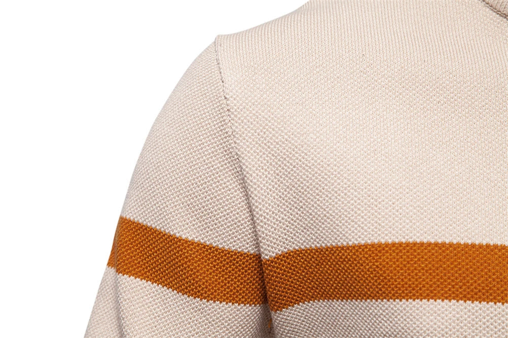 A stylish, slim-fit sweater in a modern colour-blocking design of Lake Green, White, and Grey, made with premium cotton for exceptional comfort and New Zealand casual style.