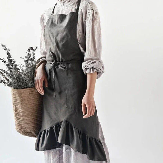 A nordic-inspired linen pleated apron with an adjustable design, perfect for baristas and home chefs in New Zealand.