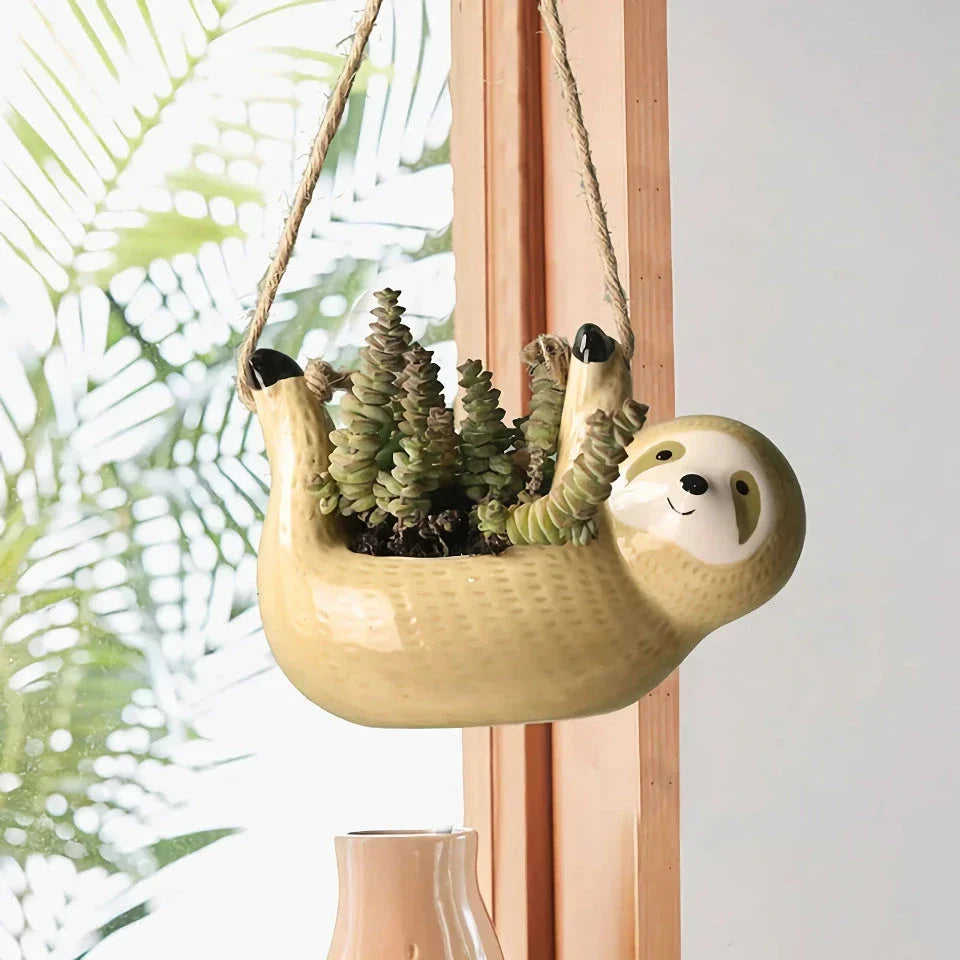 Ceramic Cartoon Animal Hanging Plant Pot with unique design and vibrant colours, perfect for adding personality to indoor spaces.