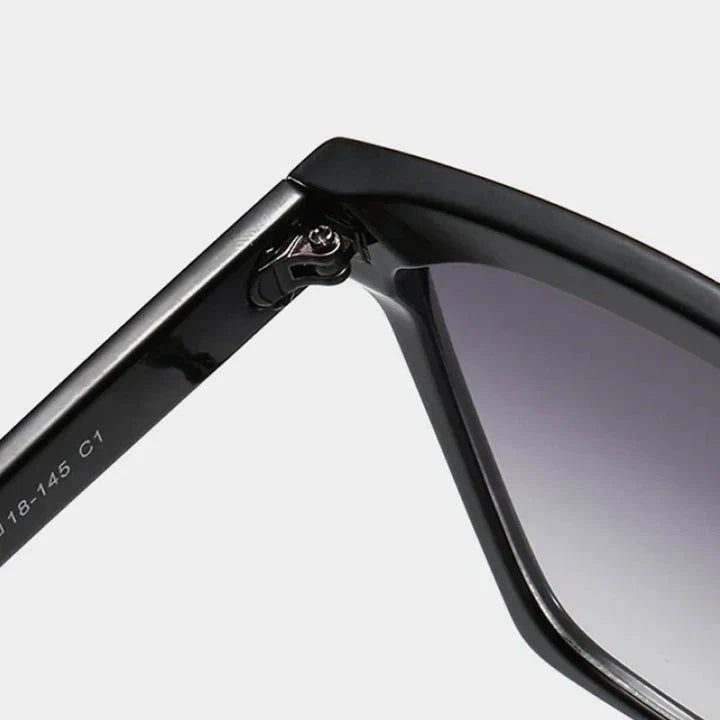 Stylish oversized square sunglasses with gradient lenses, designed for fashion-forward Kiwi women to protect their eyes from harmful UV rays.
