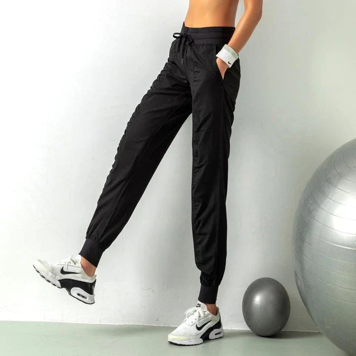 Comfortable and versatile sports pants for active Kiwi women, featuring a relaxed fit, drawstring waist, and convenient pockets.