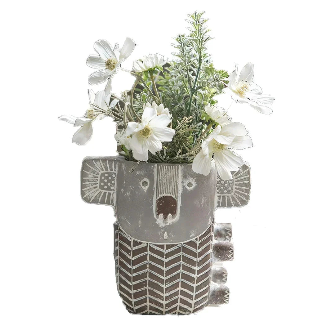 Charming kiwi-inspired koala-shaped cement planter for displaying succulents, small flowers, or as a decorative piece