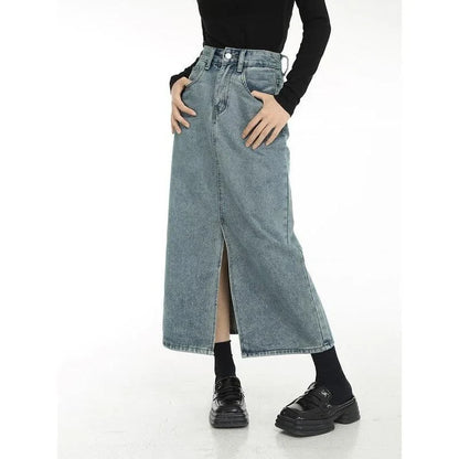 A stylish vintage-inspired denim midi skirt with a front slit, perfect for casual and special occasions.