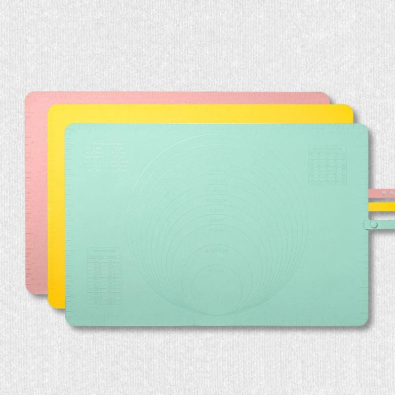 Large, thick silicone rolling pad in yellow, green, and pink colours for kneading dough and baking in the New Zealand kitchen