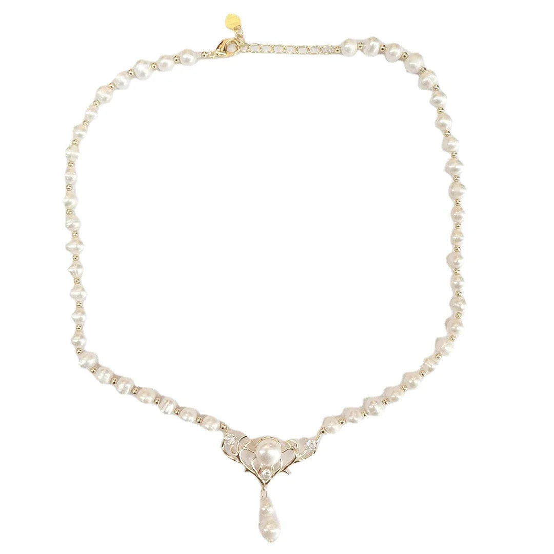 Elegant Freshwater Pearl Deer Horn Necklace with a smooth, polished finish and a versatile snake bone chain