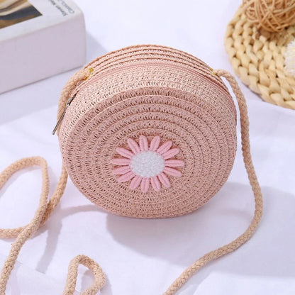 Rattan handmade crossbody bag in a vibrant, candy-coloured hue, perfect for summer adventures in New Zealand