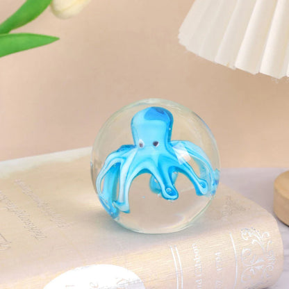 Handcrafted glass octopus windshield washer fluid ornament in ocean blue and tea brown colours, made in New Zealand
