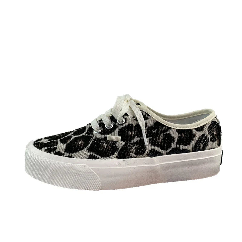 Stylish leopard print sneakers with a canvas upper and beef tendon sole, designed for the active Kiwi lifestyle.