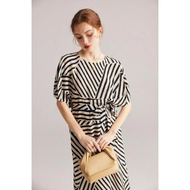 Elegant striped dress made from luxurious Mulberry silk with batwing sleeves, perfect for Kiwi women's fashion.