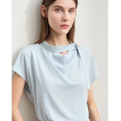 Minimalism Summer Solid Women's Blouse in Blue, featuring a loose swing neck, tie sleeves, and hollow-out decoration for a chic, breathable summer office look.