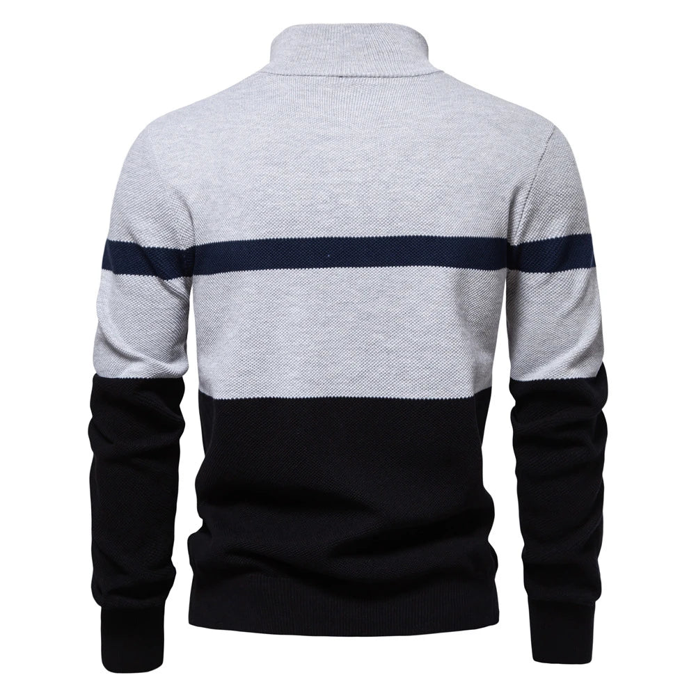 A stylish, slim-fit sweater in a modern colour-blocking design of Lake Green, White, and Grey, made with premium cotton for exceptional comfort and New Zealand casual style.