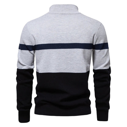 A stylish, slim-fit sweater in a modern colour-blocking design of Lake Green, White, and Grey, made with premium cotton for exceptional comfort and New Zealand casual style.