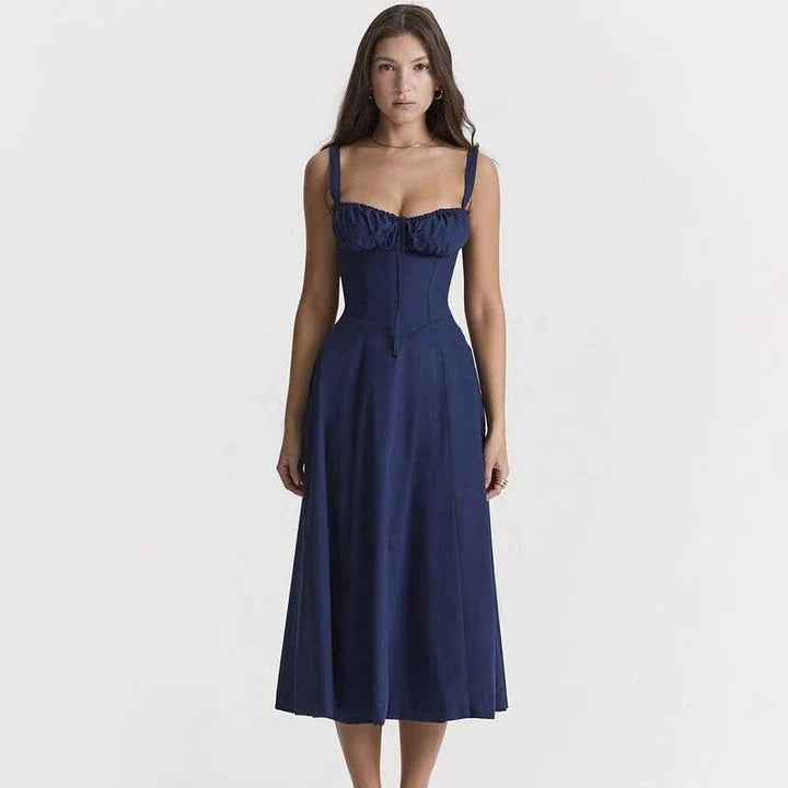 Elegant backless midi sundress in blue, featuring a high split and A-line silhouette for a flattering fit