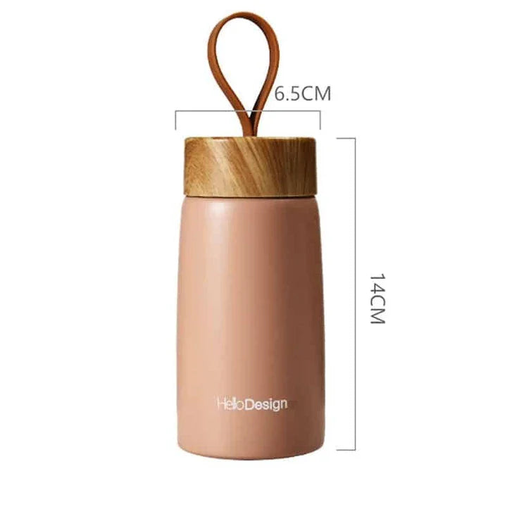 Compact and insulated mini coffee mug in pink color, featuring durable stainless steel construction and leak-proof lid for Kiwis on the go