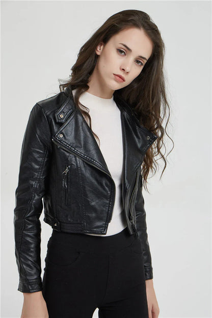 Trendha Women's Short Leather Jacket in Black, featuring a weathered finish and rivet detailing for a stylish, urban-inspired look