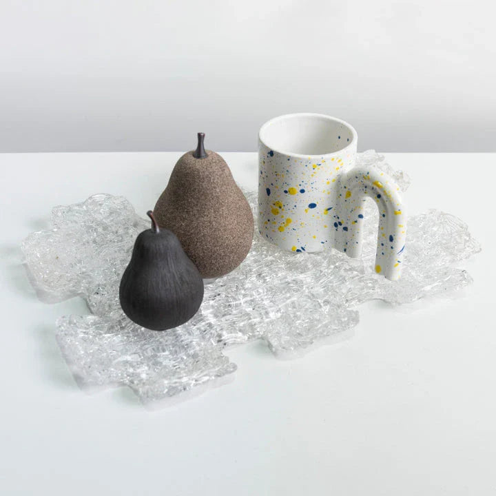 Handcrafted ceramic pear decoration with a sleek, modern design, perfect for adding a touch of natural elegance to any Kiwi home