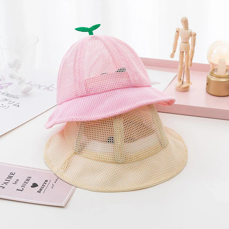 A breathable mesh bucket hat with a cute sprout design, perfect for keeping Kiwi kids cool and stylish during the summer.