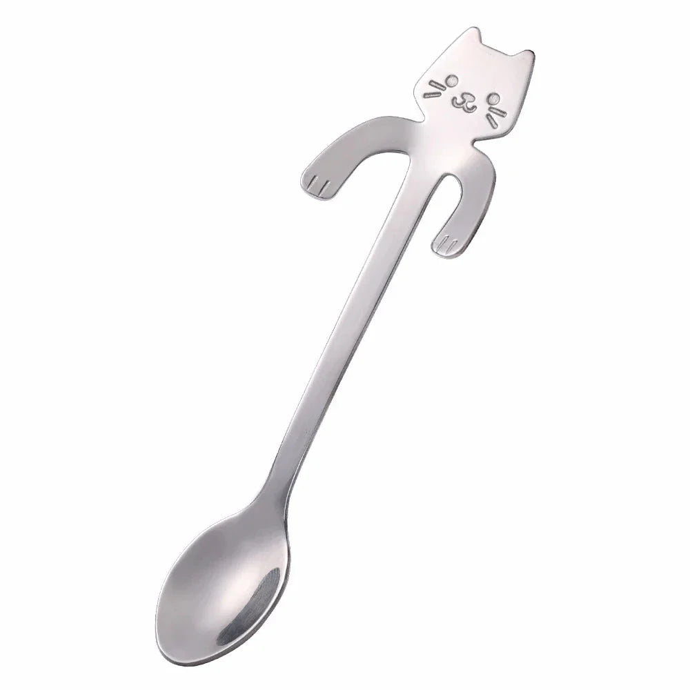 Charming cat-shaped stainless steel teaspoon with a sleek gold finish, perfect for Kiwi kitchens