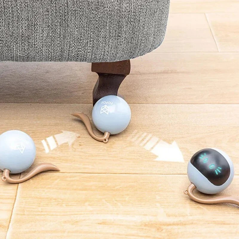 A smart interactive cat toy with a bouncing ball and colorful LED lights, designed to keep indoor cats entertained and engaged.