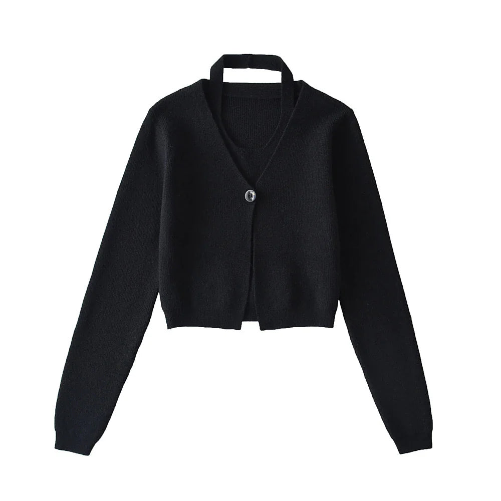 Stylish knitwear vest in a classic black or neutral colour, featuring a V-neck collar and long sleeves for a polished, versatile look.