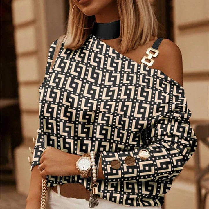 Stylish diagonal shoulder chain embellished long sleeve top in black, perfect for casual Kiwi-inspired fashion