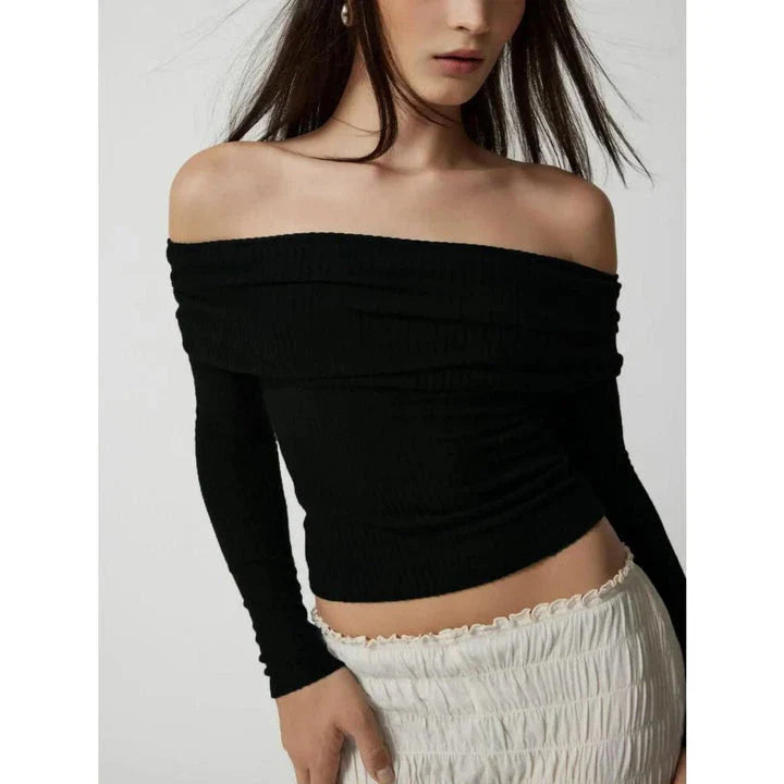 Elegant and comfortable merino wool knit sweater in a timeless design with an off-the-shoulder cut