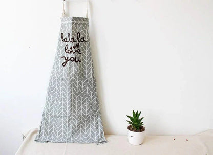 Stylish cotton kitchen apron with vibrant, Kiwi-inspired print design