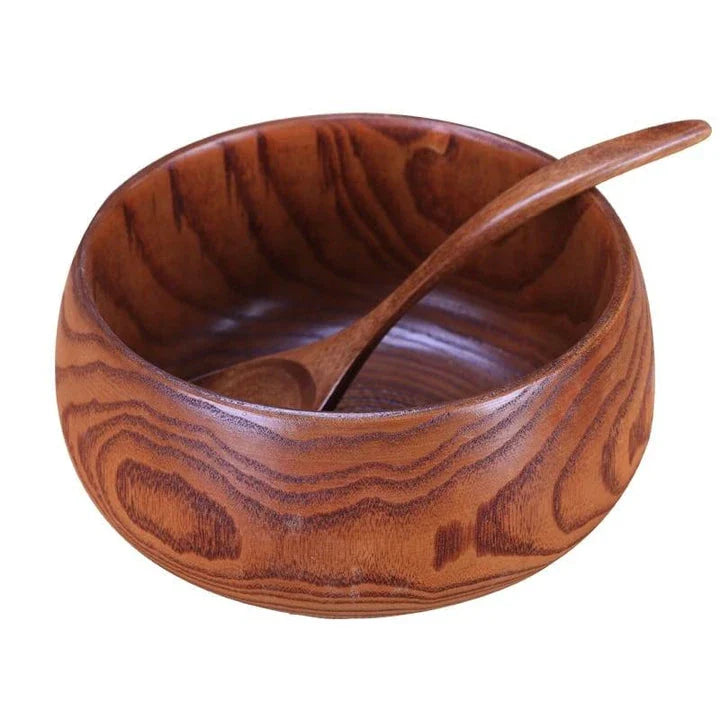 A large, round wooden soup bowl with a warm, natural brown color, perfect for serving hearty meals in Kiwi kitchens.