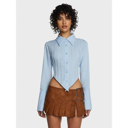 Stylish blue blouse with lace-up back and V-shaped hem, a versatile wardrobe staple with a touch of modern elegance.