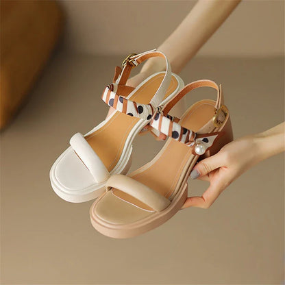 Chic open-toe leather platform sandals with adjustable buckle strap and square heel, perfect for Kiwi summer style.