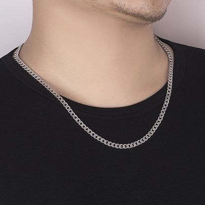 Stylish Cuban chain necklace with rhodium gold plating and silver buttons, a premium accessory for Kiwi fashion