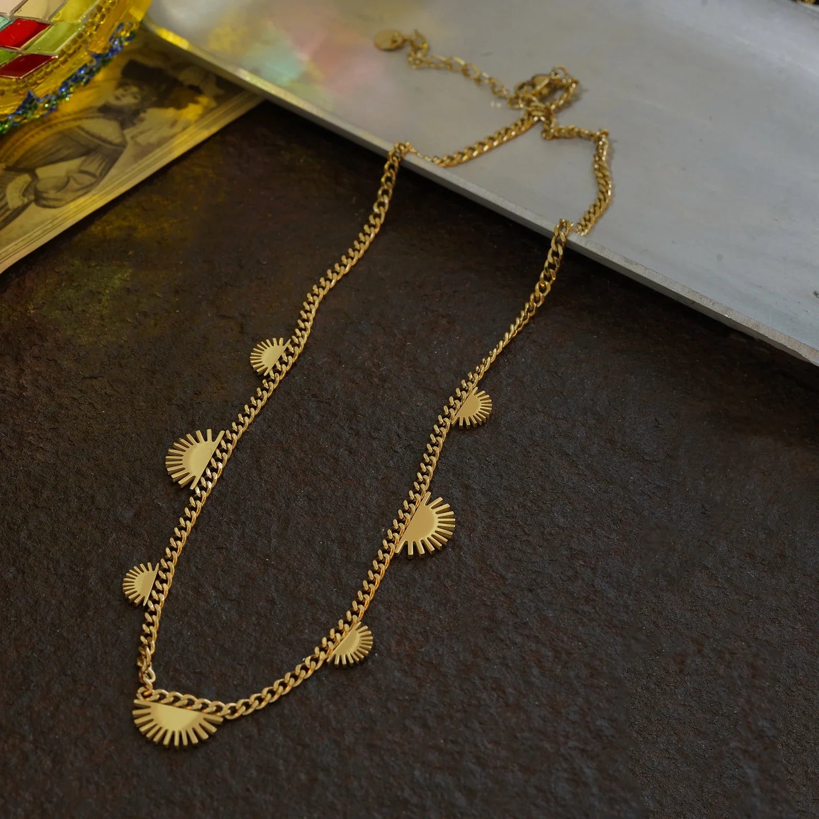 A minimalist, layered titanium steel necklace with an adjustable chain length and a 2 cm pendant, perfect for elevating your everyday style.