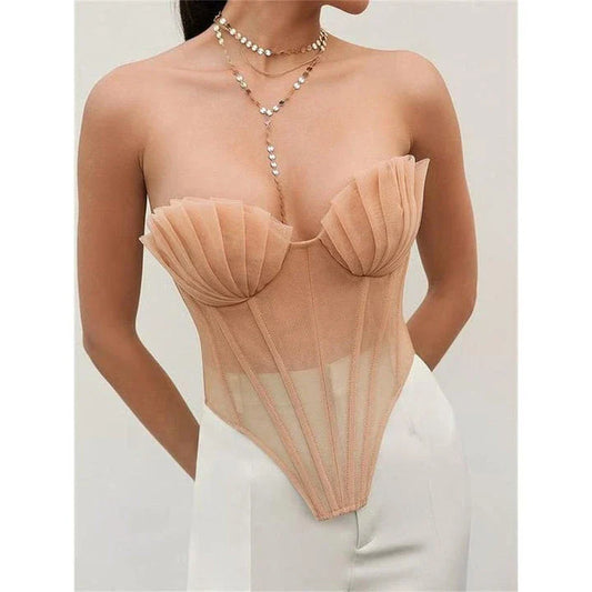 Champagne pink vintage mesh corset top with a strapless, backless design and ruched detailing for a sophisticated, edgy look.