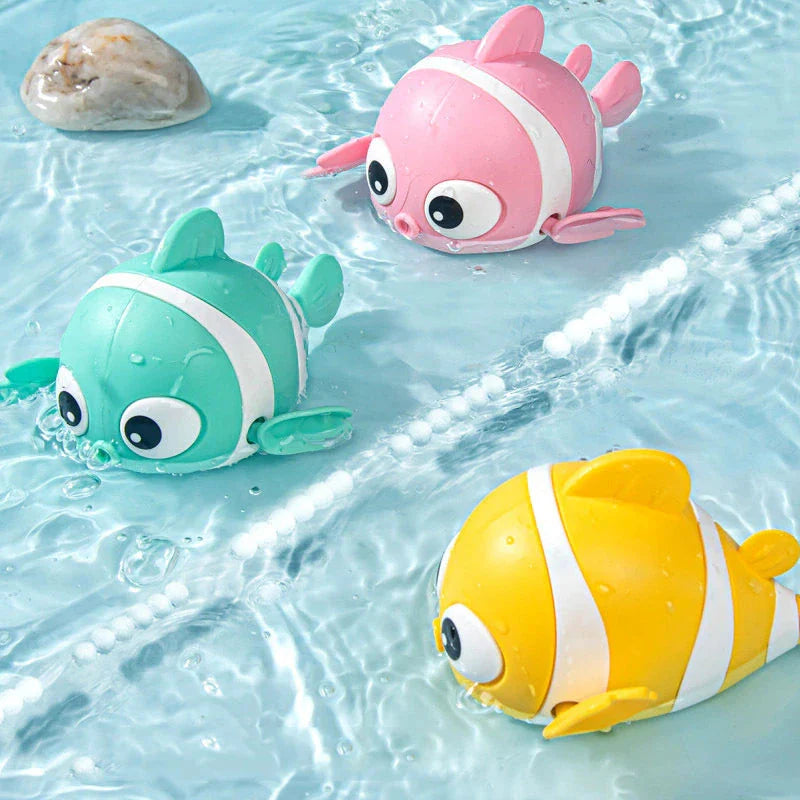 Cartoon fish wind-up bath toy in green, designed for New Zealand toddlers to enjoy during bathtime