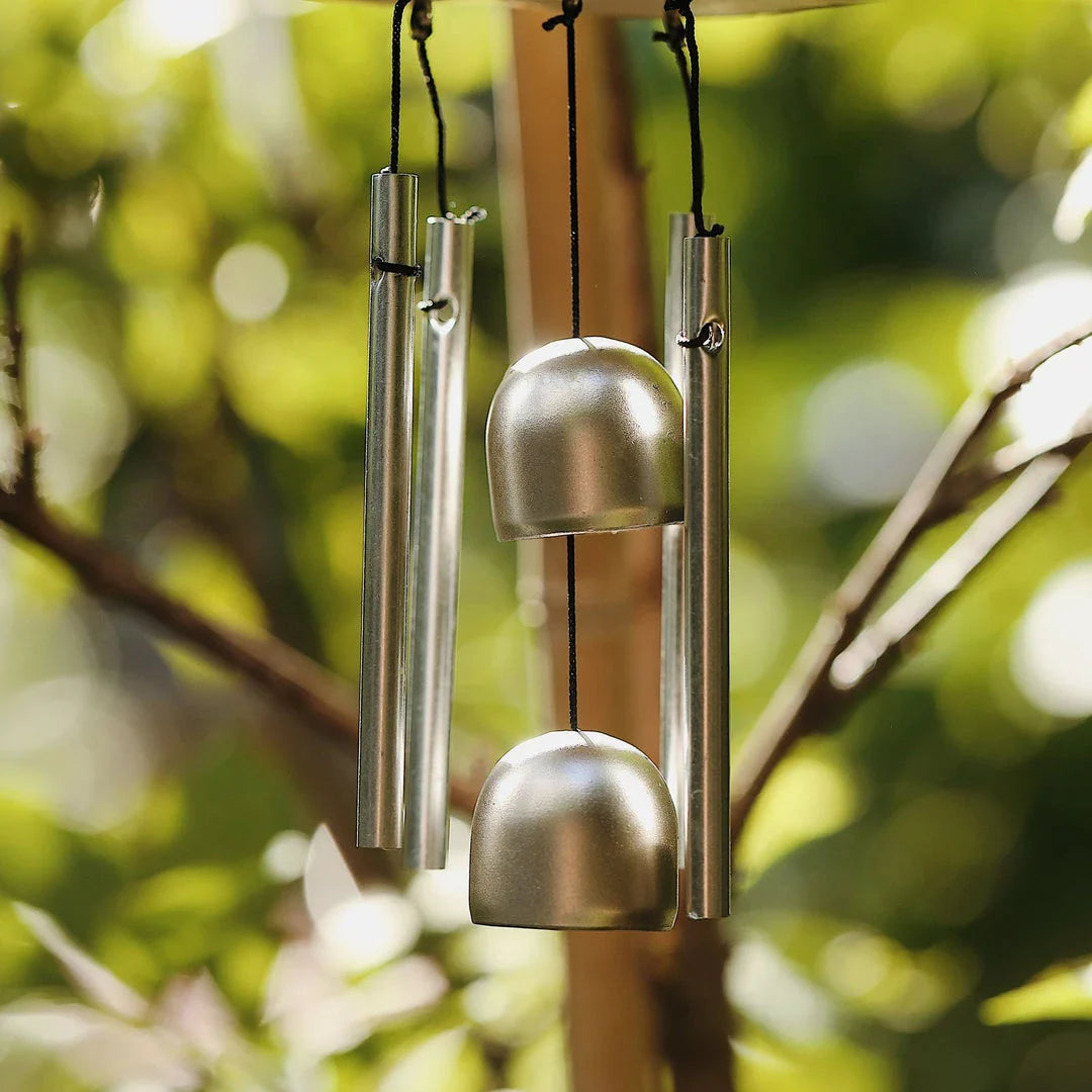 Charming wind chime featuring resin birds in vibrant Kiwi colours, swaying gently in the breeze and emitting a melodious sound.