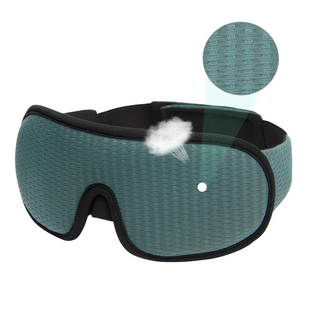 Soft, breathable 3D memory foam sleep mask in gray color providing total darkness and pressure relief for restful sleep
