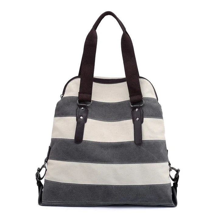 Stylish and practical Kiwi-crafted canvas tote bag with roomy interior, durable polyester lining, and adjustable shoulder straps