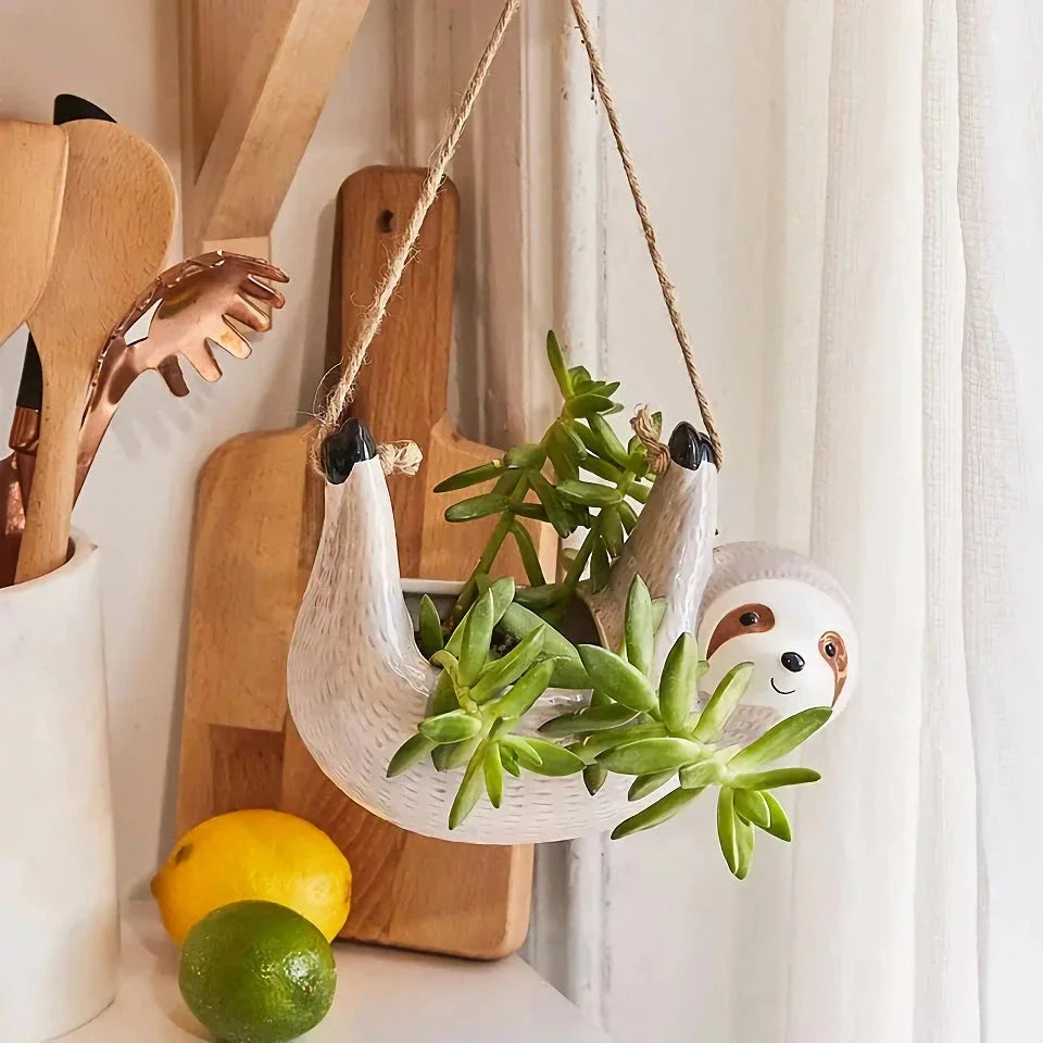 Ceramic Cartoon Animal Hanging Plant Pot with unique design and vibrant colours, perfect for adding personality to indoor spaces.