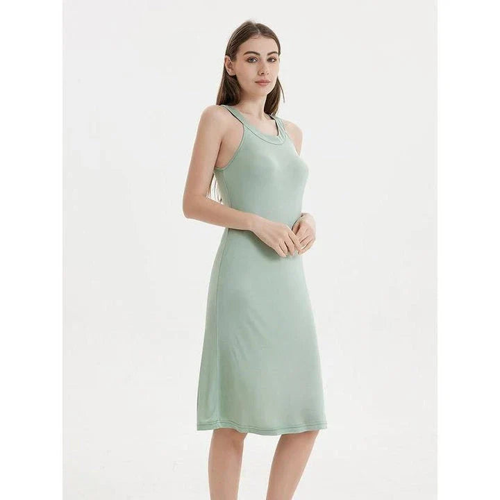 Elegant silk-blend halter midi dress in green and white, perfect for Kiwi women's summer fashion