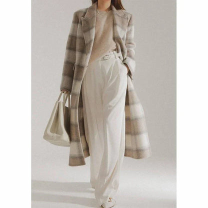 A stylish plaid double-breasted long wool coat for fashionable Kiwi women, featuring a cozy and elegant design with functional pockets and a versatile turn-down collar.
