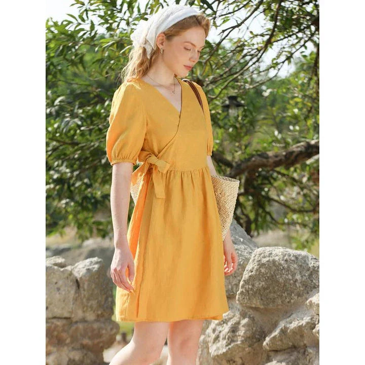 Stylish linen mini dress with puff sleeves and lace-up detail, perfect for Kiwi summer