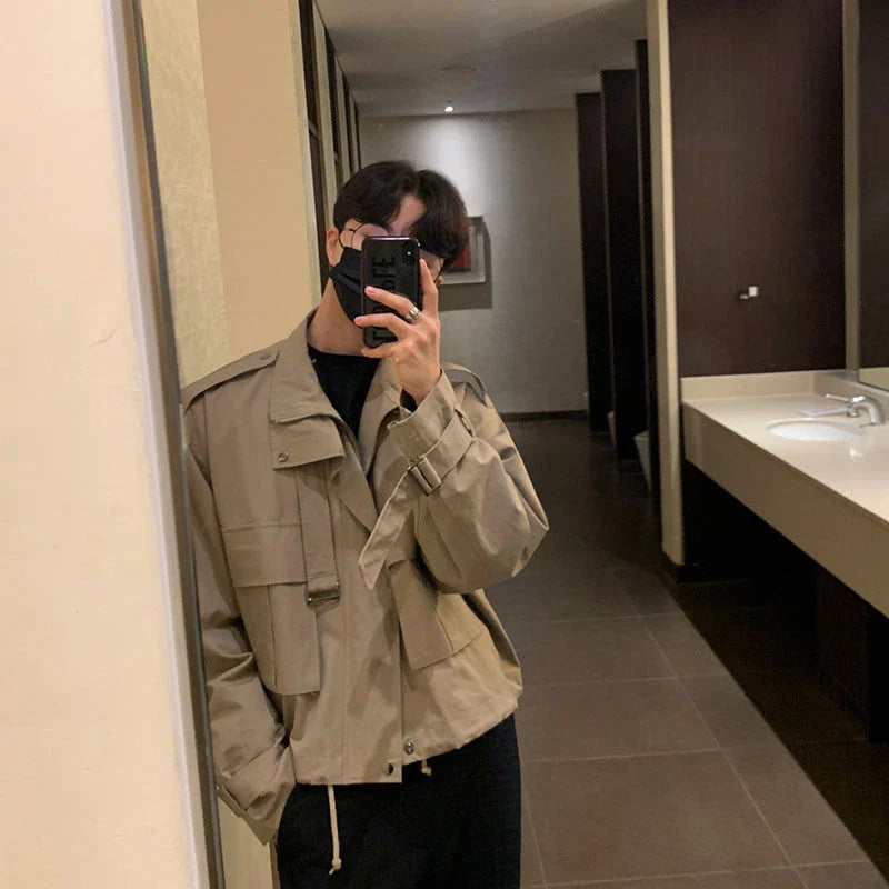 A stylish vintage-inspired jacket with an overalls-inspired design, featuring a lightly mature aesthetic and premium construction.