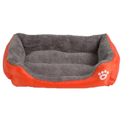 A cozy, waterproof pet bed featuring a soft fleece lining and paw print design, perfect for providing comfort and support for your beloved companion.